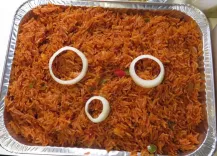 Tray of Jollof Rice, 40 Grilled Chicken & Fruit Shoot Drink